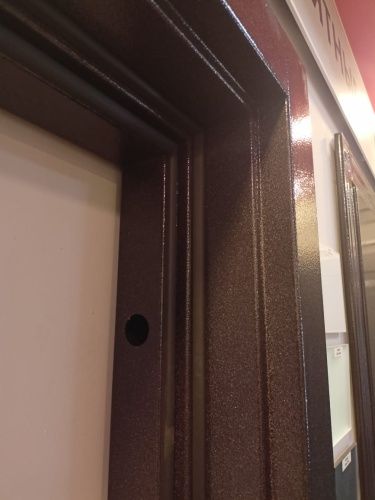 Входная термодверь Snegir PRO Букле коричневый - Бьянко S60-L1 с двойным листом металла фото 3